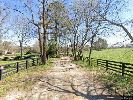 Gated drive and acreage at Little River Way